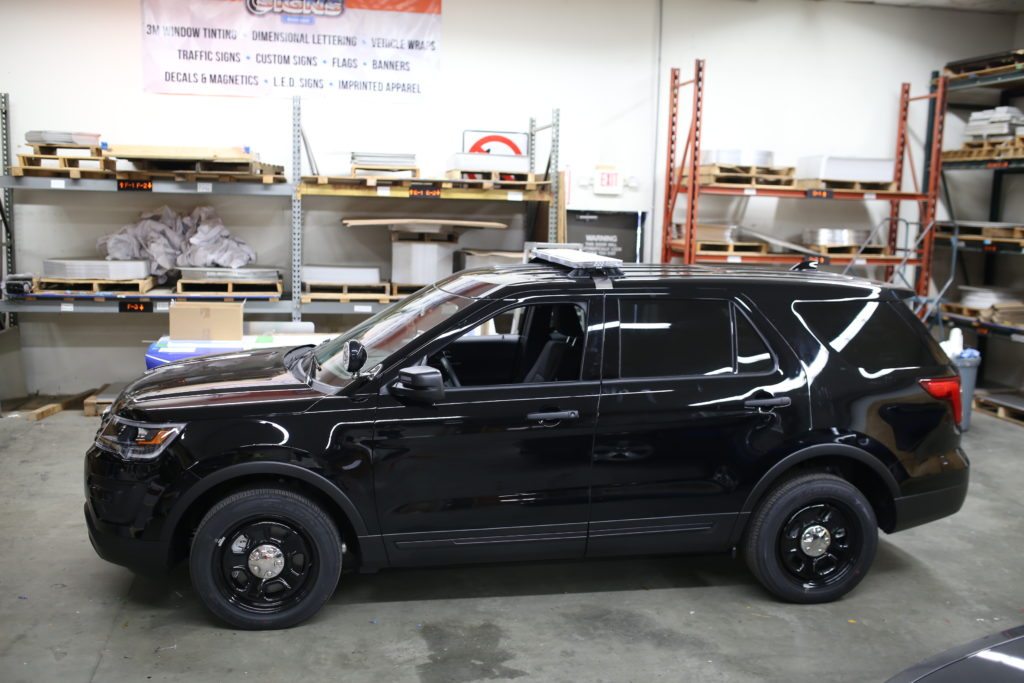 Police Car reflective graphics on a Ford Explorer